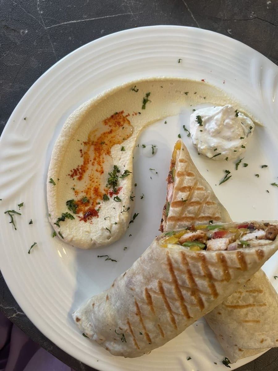 Grilled Chicken Pepper Wrap with Hummus and Garlic Yogurt, a recipe from Bloomplate 250